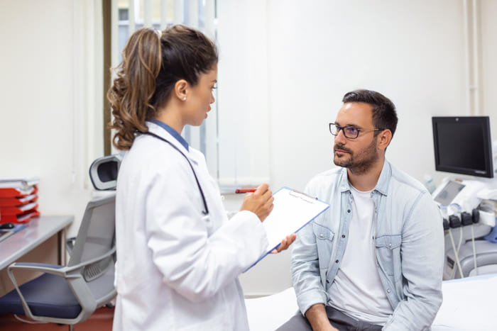 A doctor consulting with a patient